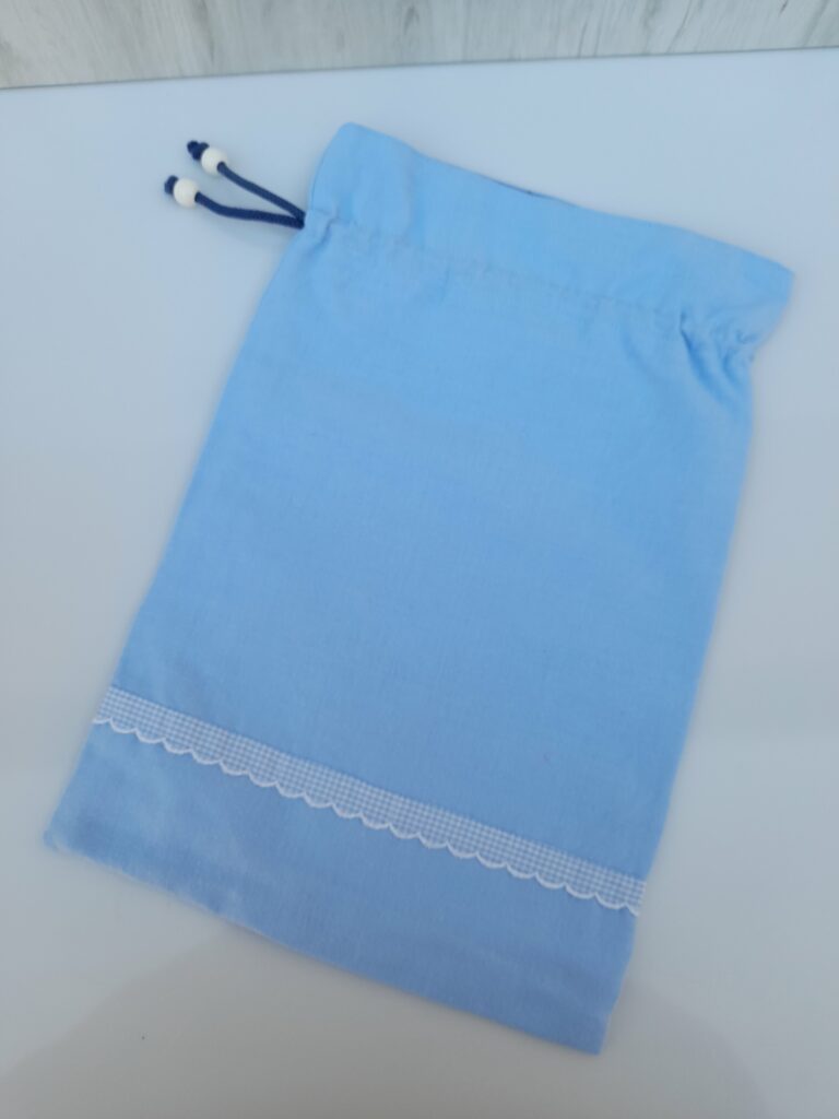 Sac à linge dos bleu ciel