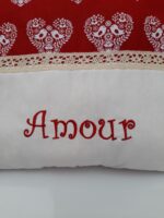 Coussin brodé rouge